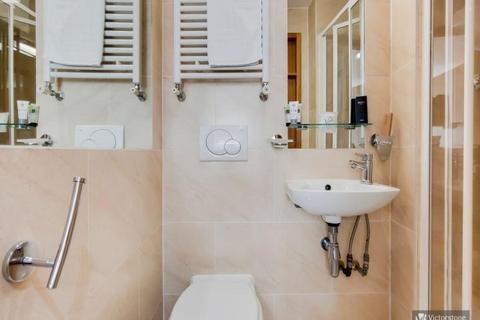 Studio to rent, Cartwright Gardens, London, Greater London, WC1H