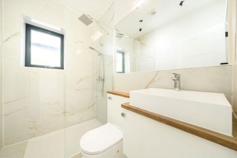 1 Withycombe Road, London, SW19 6AN
