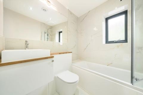 1 Withycombe Road, London, SW19 6AN