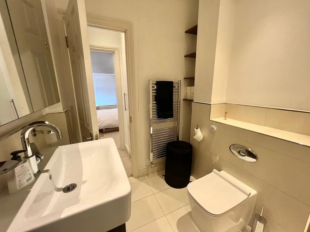 A modern and well-maintained bathroom featuring...