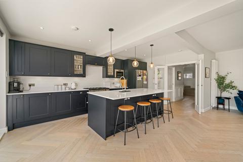 84 Manor Road North, Esher, KT10 0AD