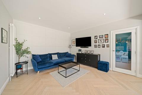 84 Manor Road North, Esher, KT10 0AD