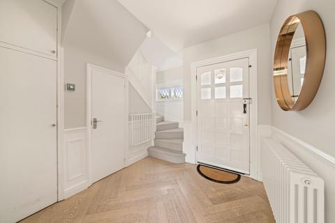 84 Manor Road North, Esher, KT10 0AD