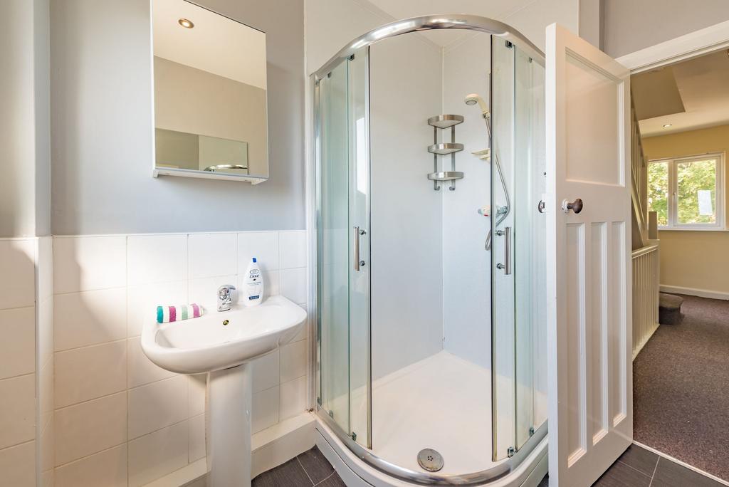 Bright and clean bathroom featuring a modern co...