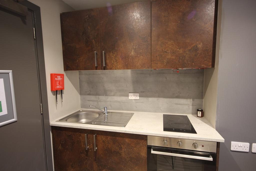 A modern and tidy kitchenette featuring stylish...