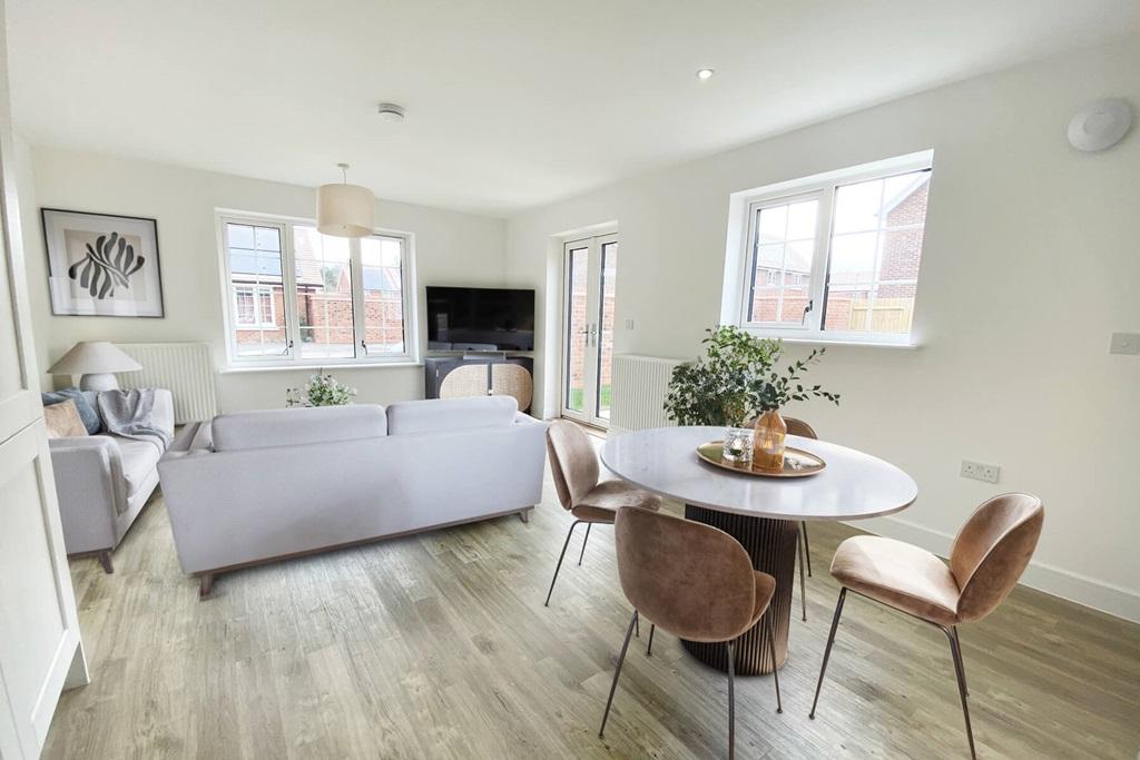 Open plan layout with French doors to the rear...