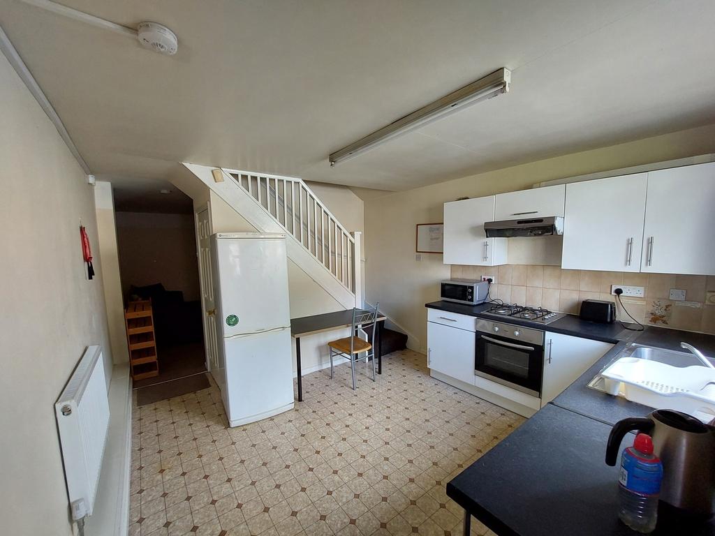This inviting kitchen features ample counter sp...