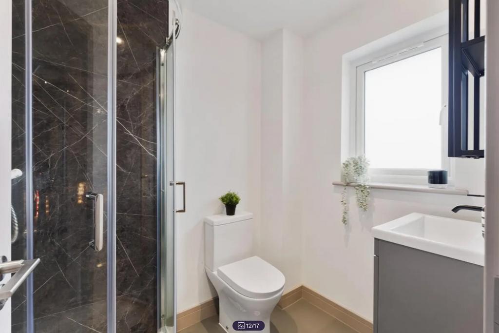 A modern and clean bathroom featuring a stylish...