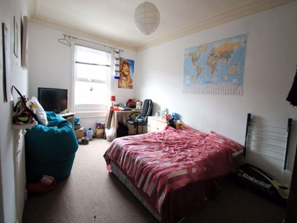 Bright and cozy double bedroom featuring a comf...