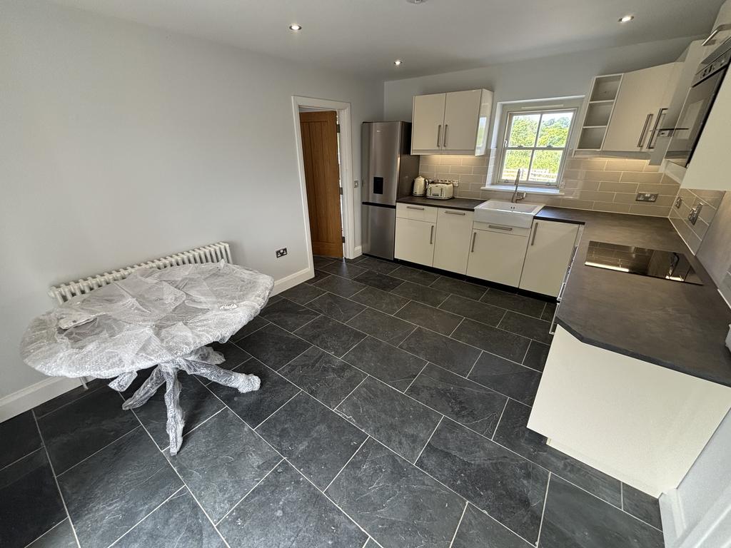 Cottage kitchen/diner (second image)