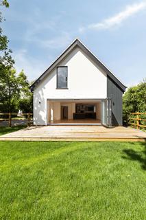 undefined, Chain Free and Tucked Away on the Edge of Town