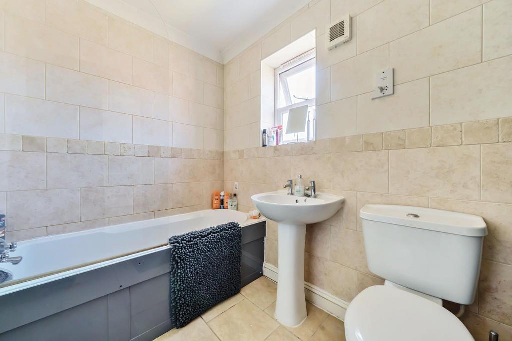 BATHROOM with shower extension over bath.jpg