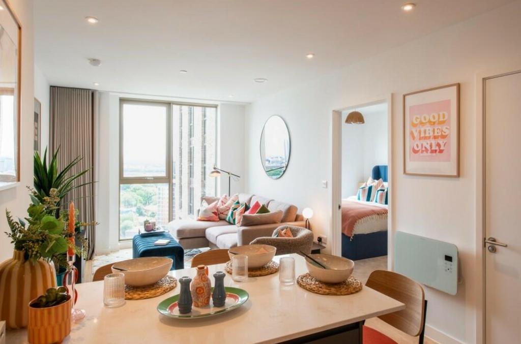 A spacious and modern living room with bright n...
