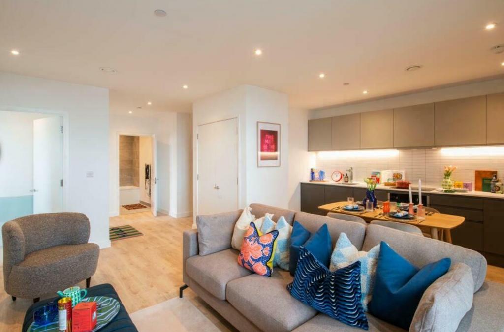 A spacious and stylish modern living room, perf...