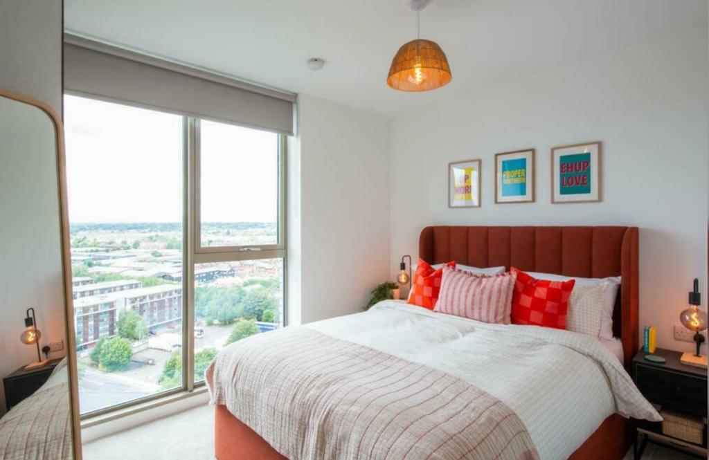 A spacious and well-lit large double bedroom wi...