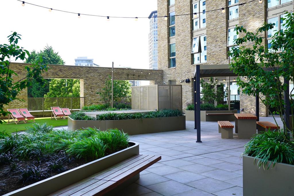 A beautifully maintained urban garden courtyard...