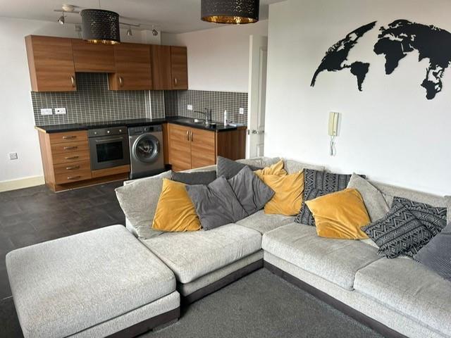 Open Plan Living Room / Fitted Kitchen:
