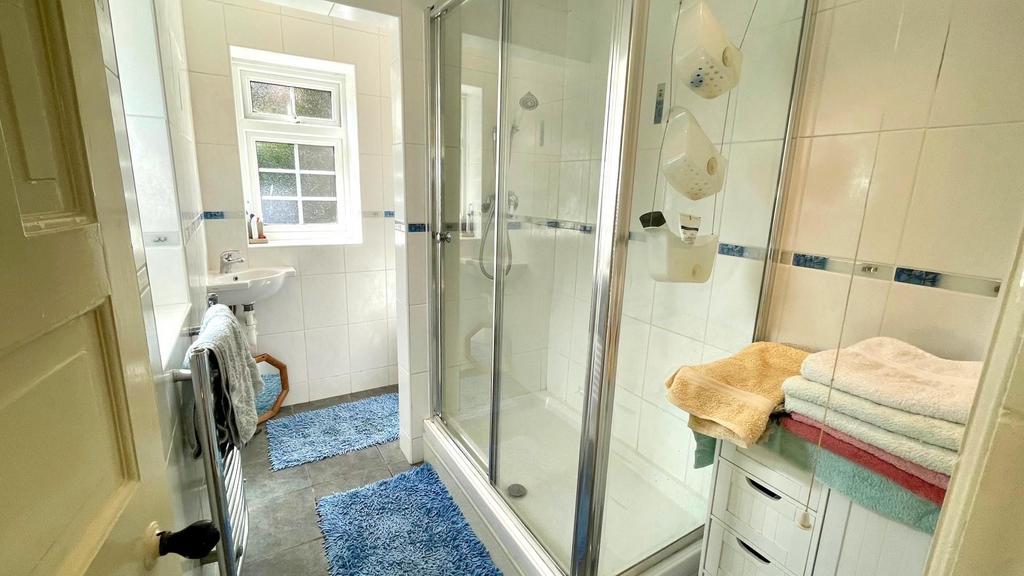 Ground floor tiled 3 piece shower room