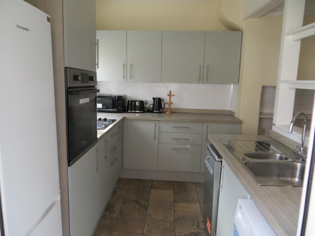 A modern and well-maintained kitchen featuring ...