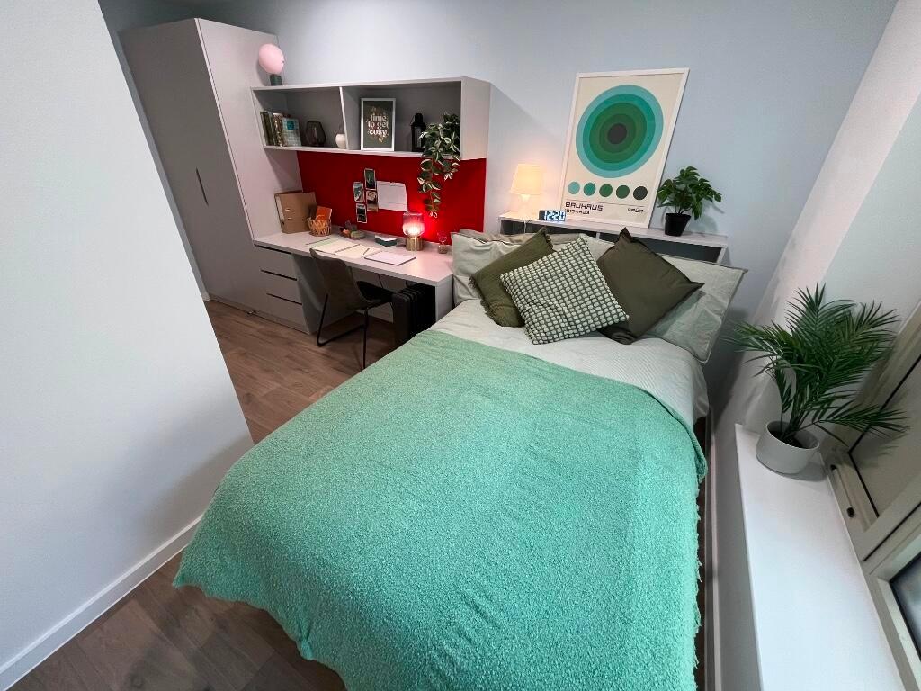 Bright and inviting master bedroom featuring a ...