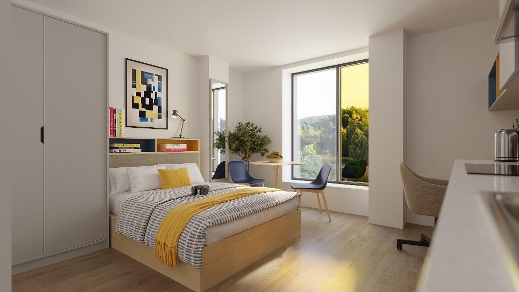 Bright and spacious master bedroom featuring a ...