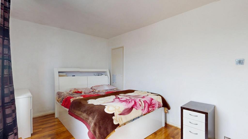 Bright and cozy double bedroom featuring a comf...