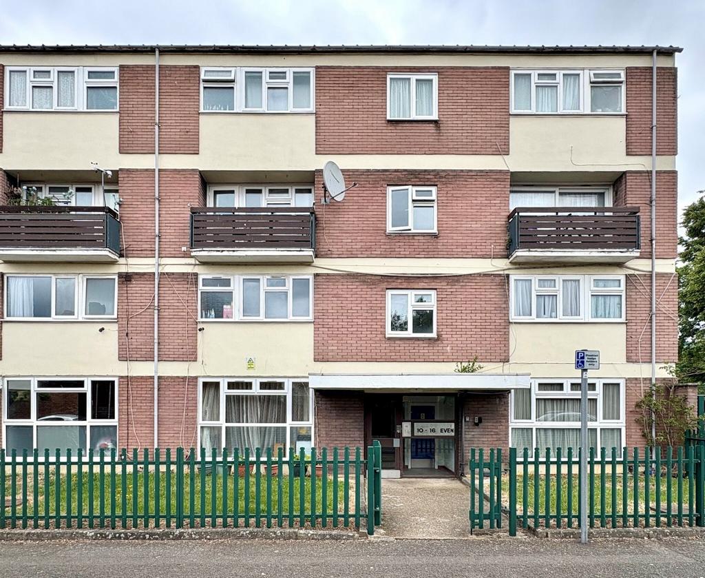 A well-maintained terraced residential building...