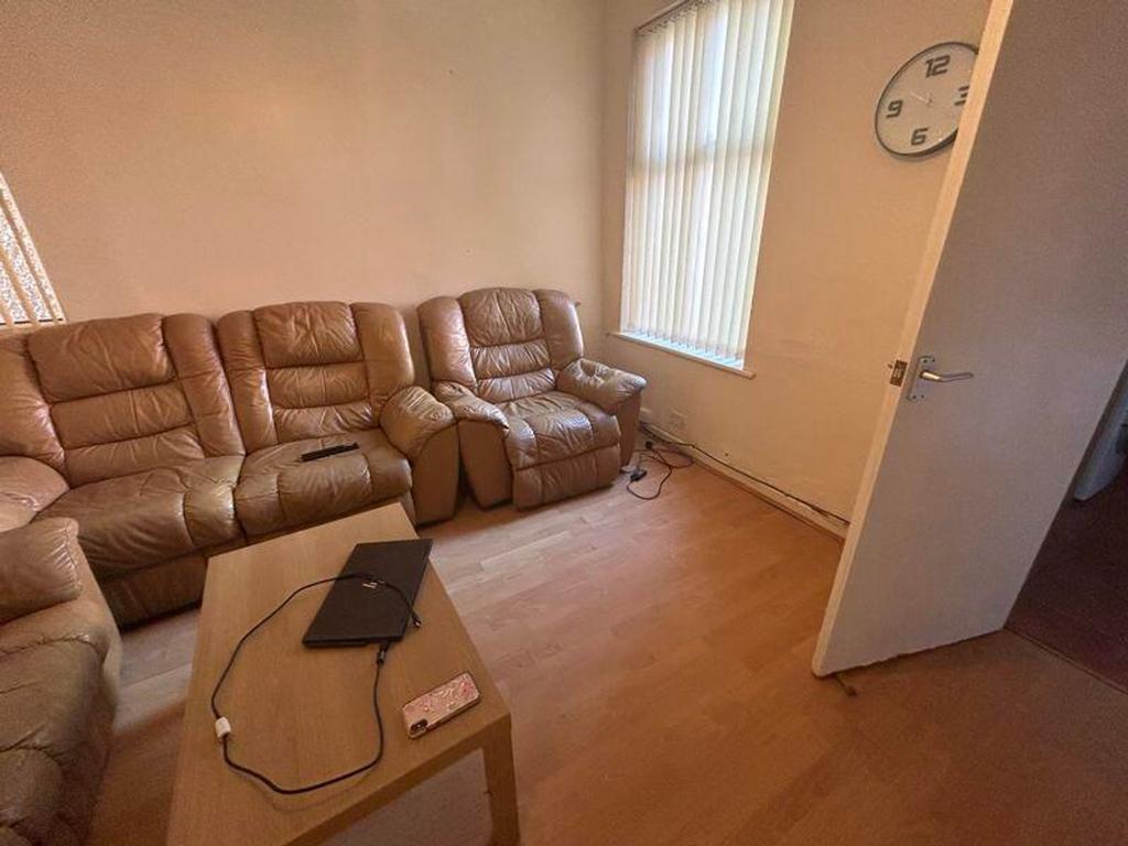 A cozy living room featuring comfortable seatin...