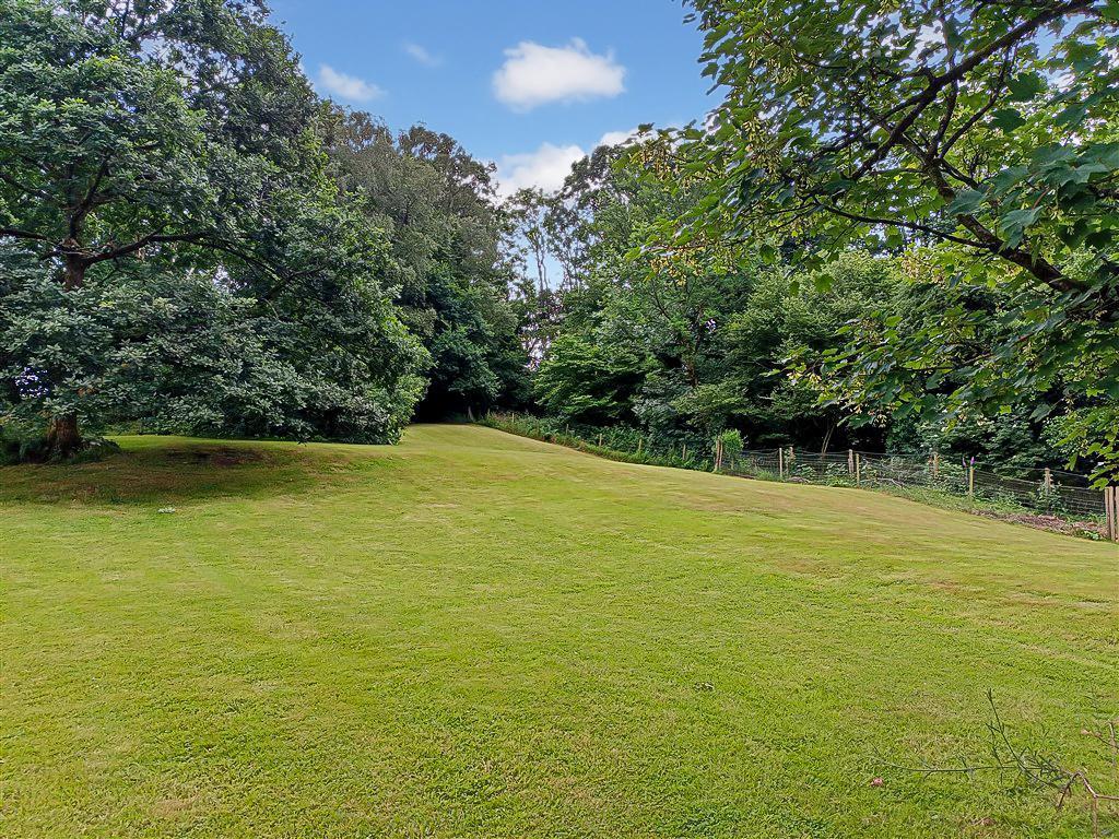 Large Gardens &amp; Wooded Backdrop
