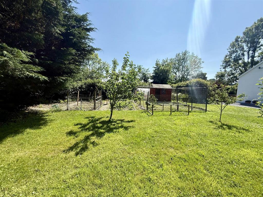 Enclosed poultry run and vegetable garden