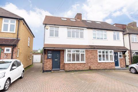 4 bedroom semi-detached house to rent, Stuart Avenue, Walton on Thames.