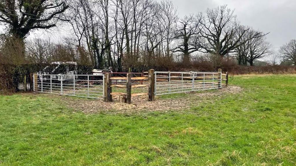 Direct gated access set-back from the road.