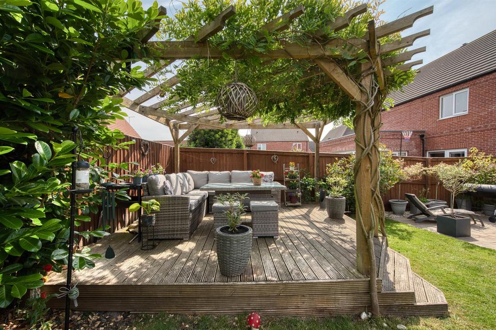 Rear Garden seating area from side.jpg