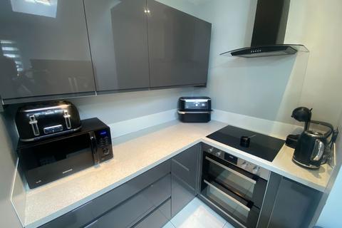 28 Ashton Crescent, Chadderton, Oldham, OL9 8HE