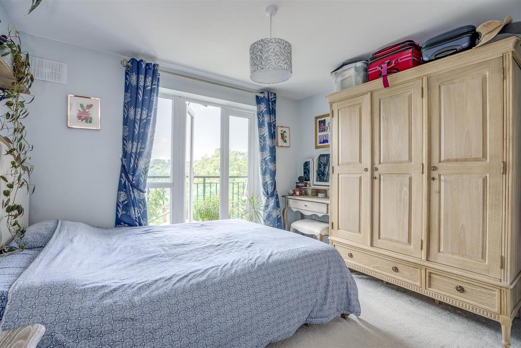 Master bedroom with balcony