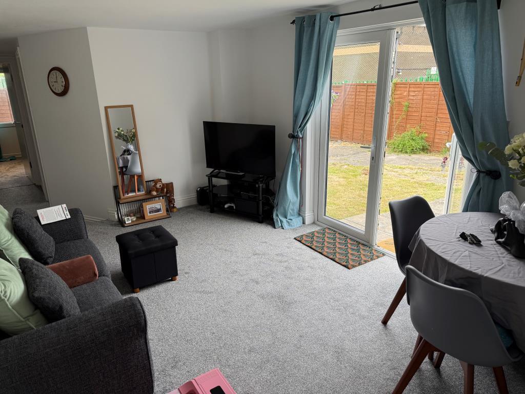 Living room with glazed doors to rea garden