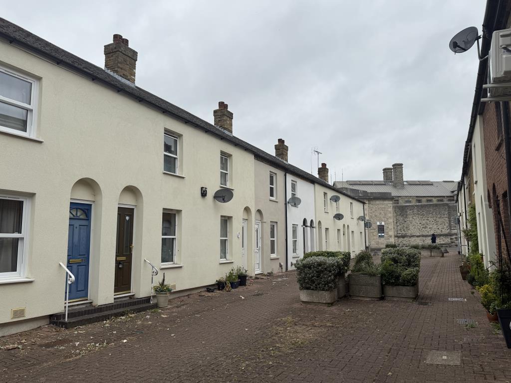 Street scene including of House in need of Improve