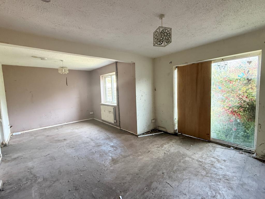Living Room &amp; Dining Room in House in need of Refu