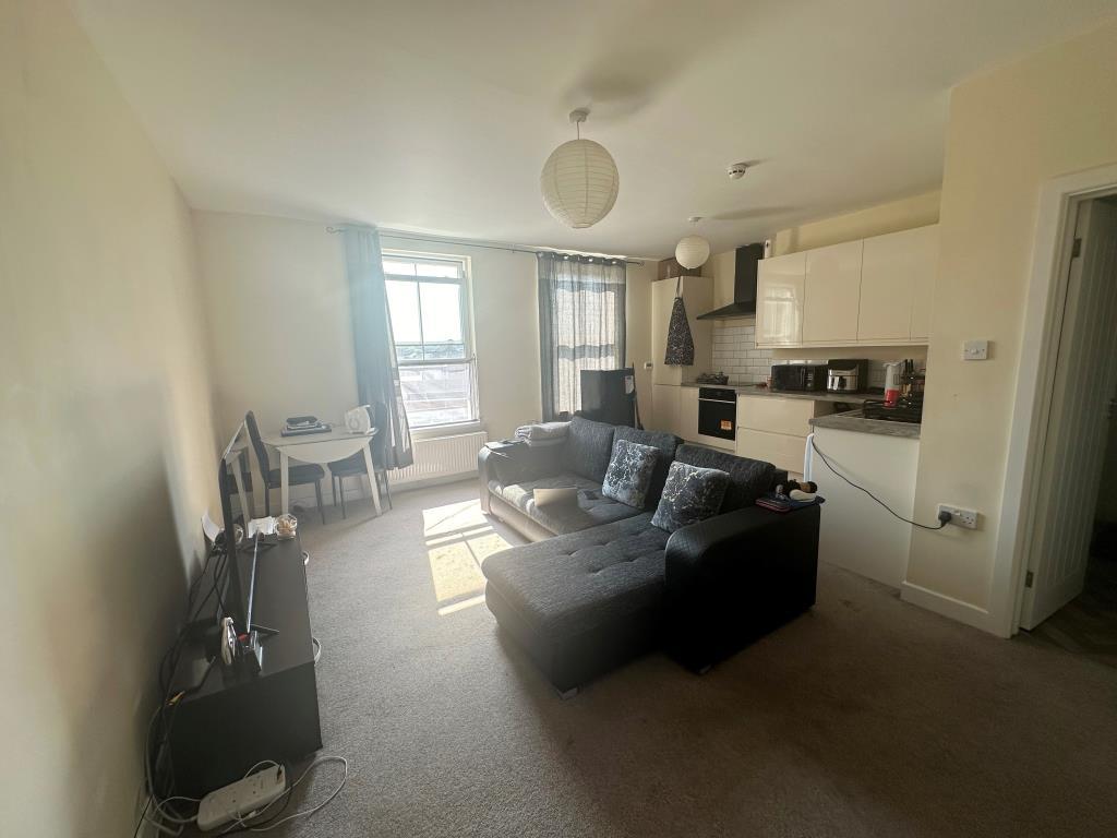 Top floor flat living room/kitchen