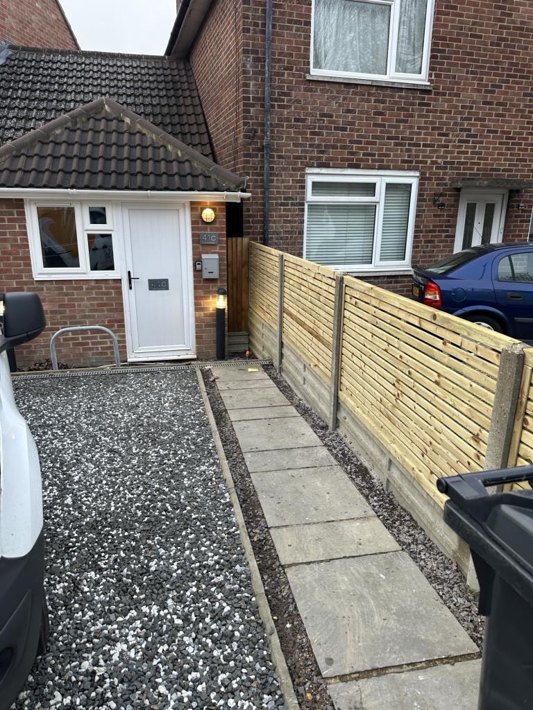 Driveway and path leading to entrance