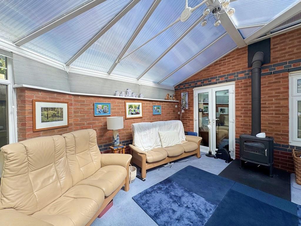 Conservatory and log burner