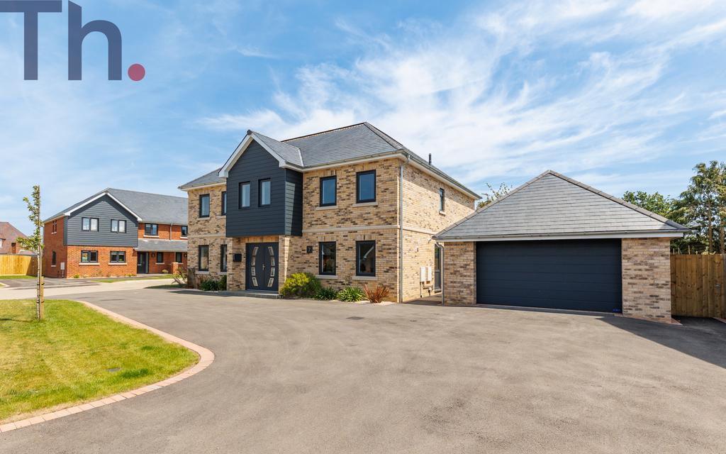 Front Elevation with Parking & Double Garage