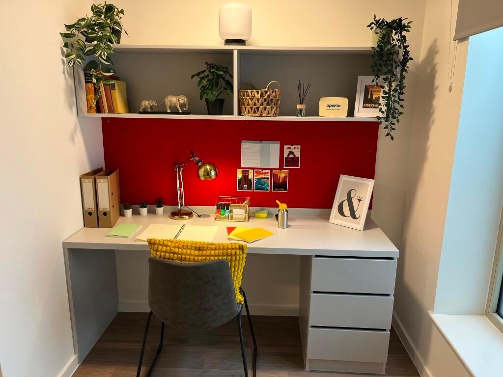 Bright and well-organized communal workspace fe...