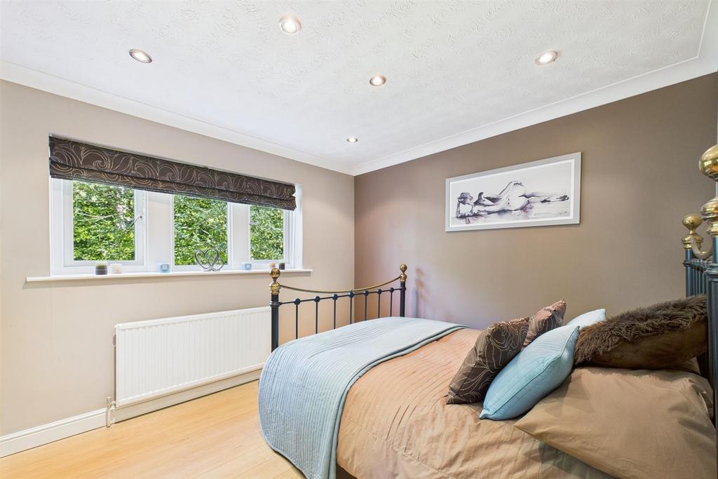 Smaller bedroom brown.jpg