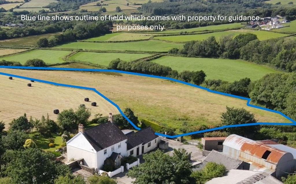 Aerial shot with blue line and writing .JPG