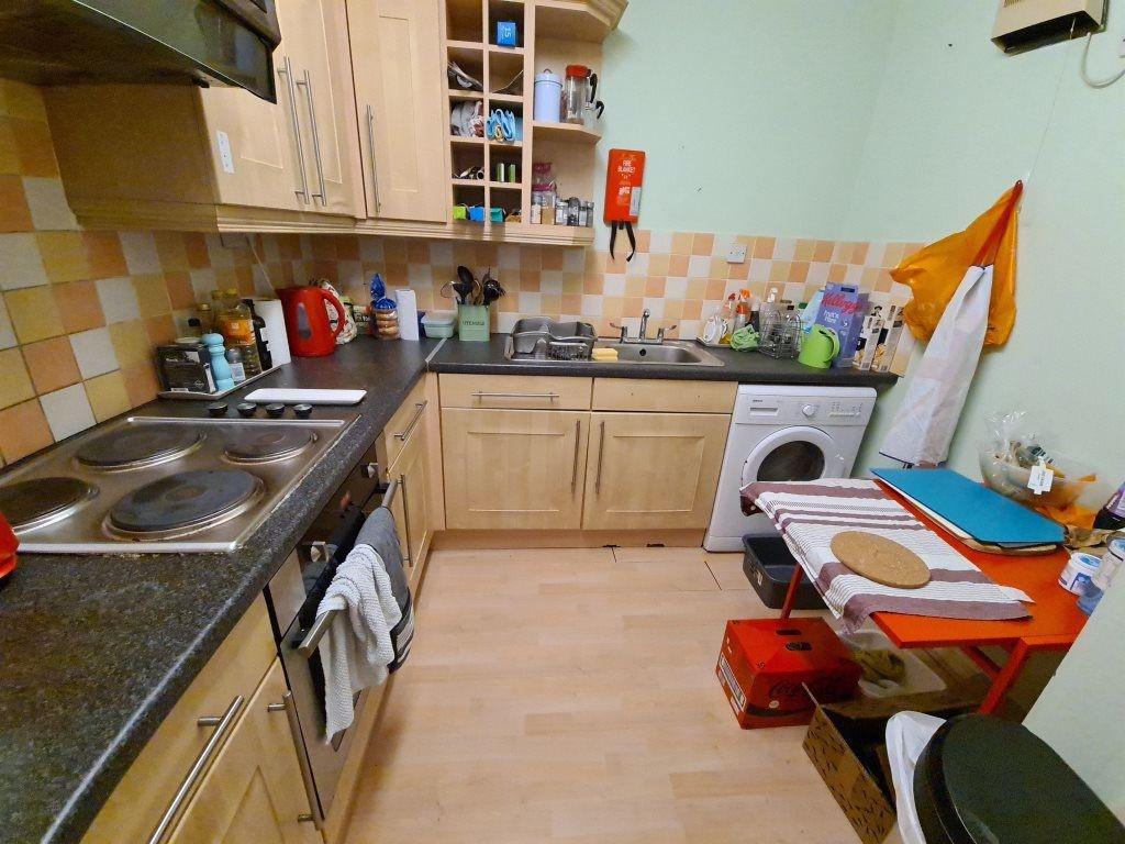 Bright and functional kitchen featuring ample c...