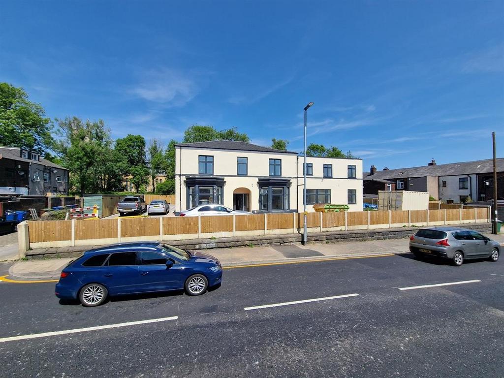 Bright and well-maintained front view of a styl...