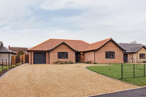 undefined, Just two bungalows remaining with 67% of site sold