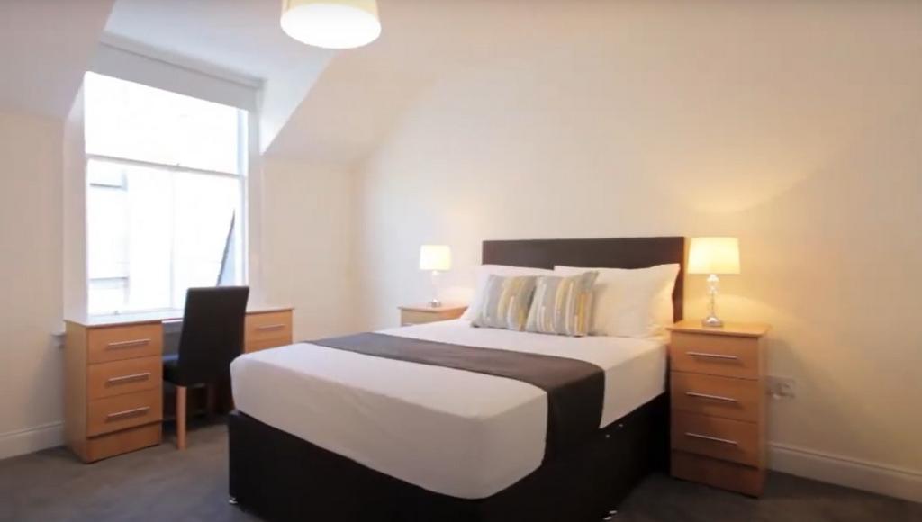Bright and inviting double bedroom featuring a ...