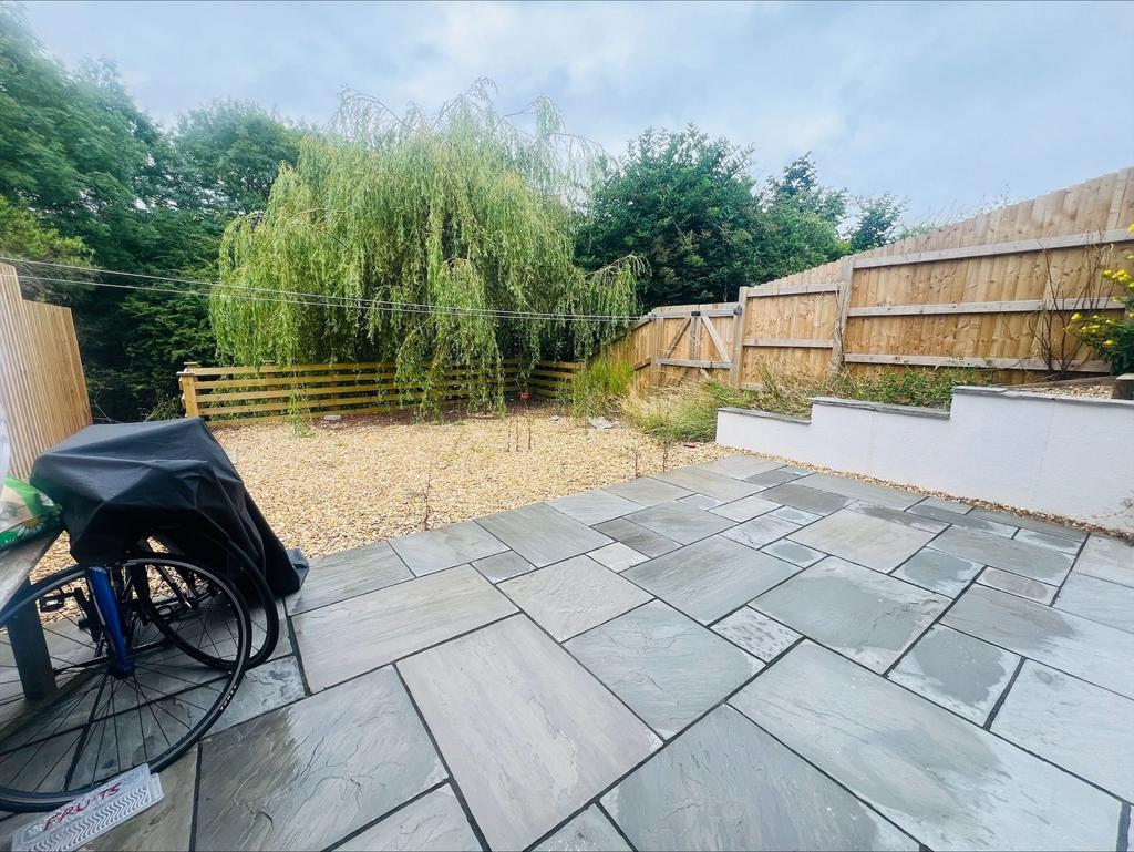 A spacious and well-maintained garden featuring...